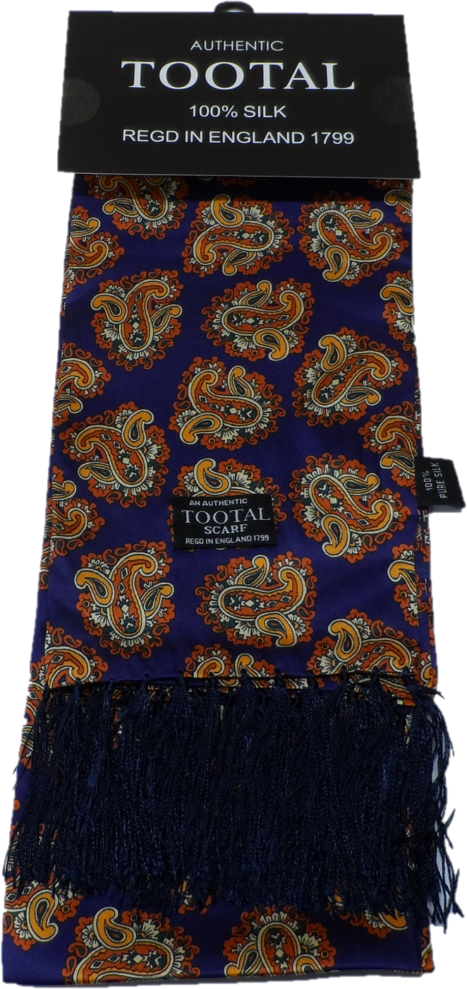 A Tootal brand silk scarf with a dark blue base and an orange, gold, and white paisley pattern, featuring a dark navy blue fringe and a black header card.