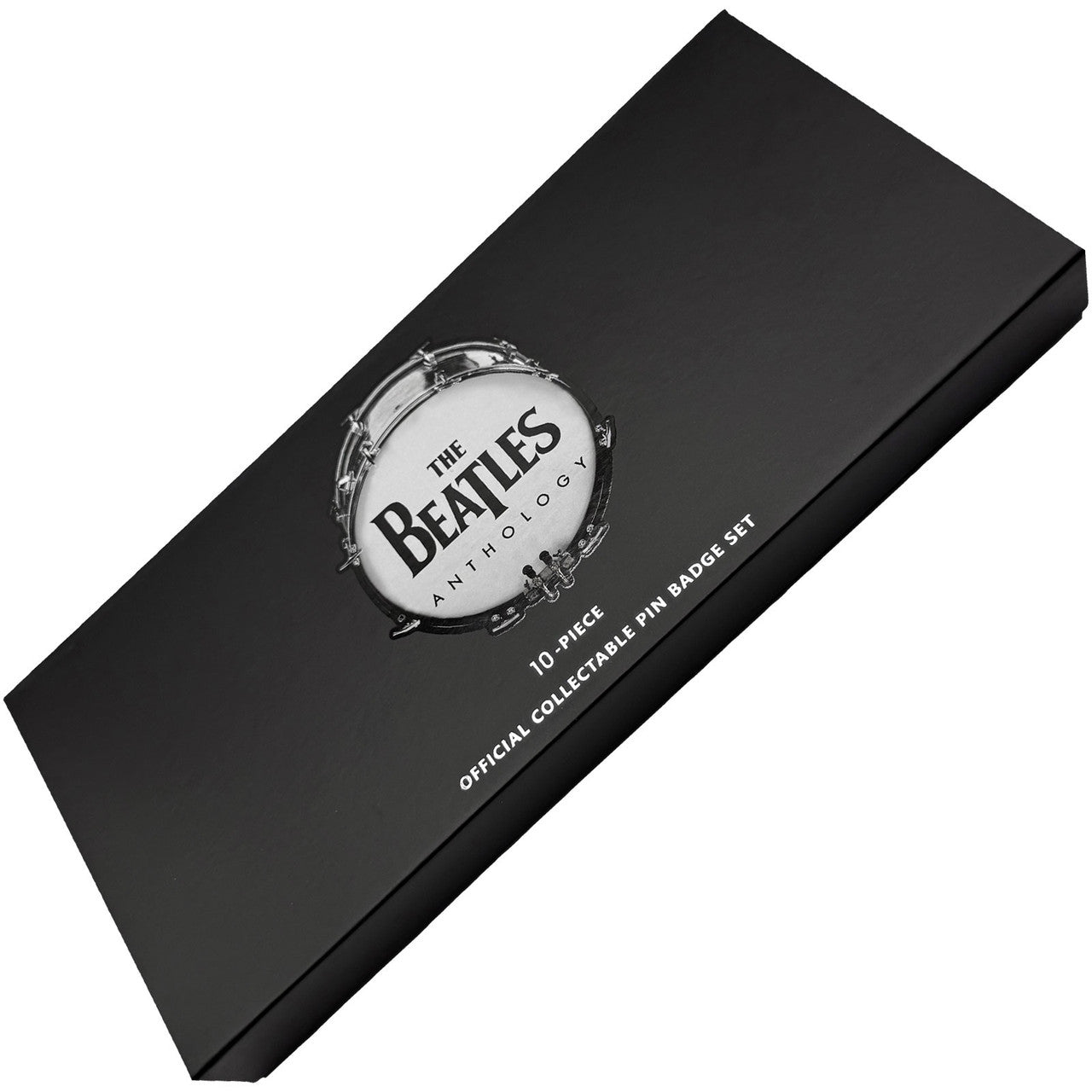The Beatles Anthology 10-piece official collectable pin badge set in a matte black presentation box, shown at an angle on a white background.