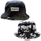 Black bucket hat with 'oasis' logo on front and reversible patterned brim.