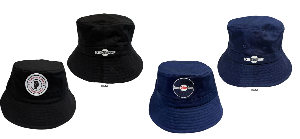 Two bucket hats shown from the front and back side on a plain white background: one black hats and one  navy blue hats, each with a circular 'Ocean Colour Scene' logo patch on the front.