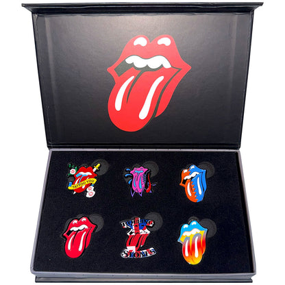 Set of Rolling Stones-themed pins in a branded box with the band's logo.