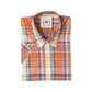 Folded plaid shirt with a brand label on a white background