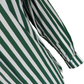 Close-up of a green and white striped long-sleeve shirt showing the fabric texture and cuff detail against a plain white background.