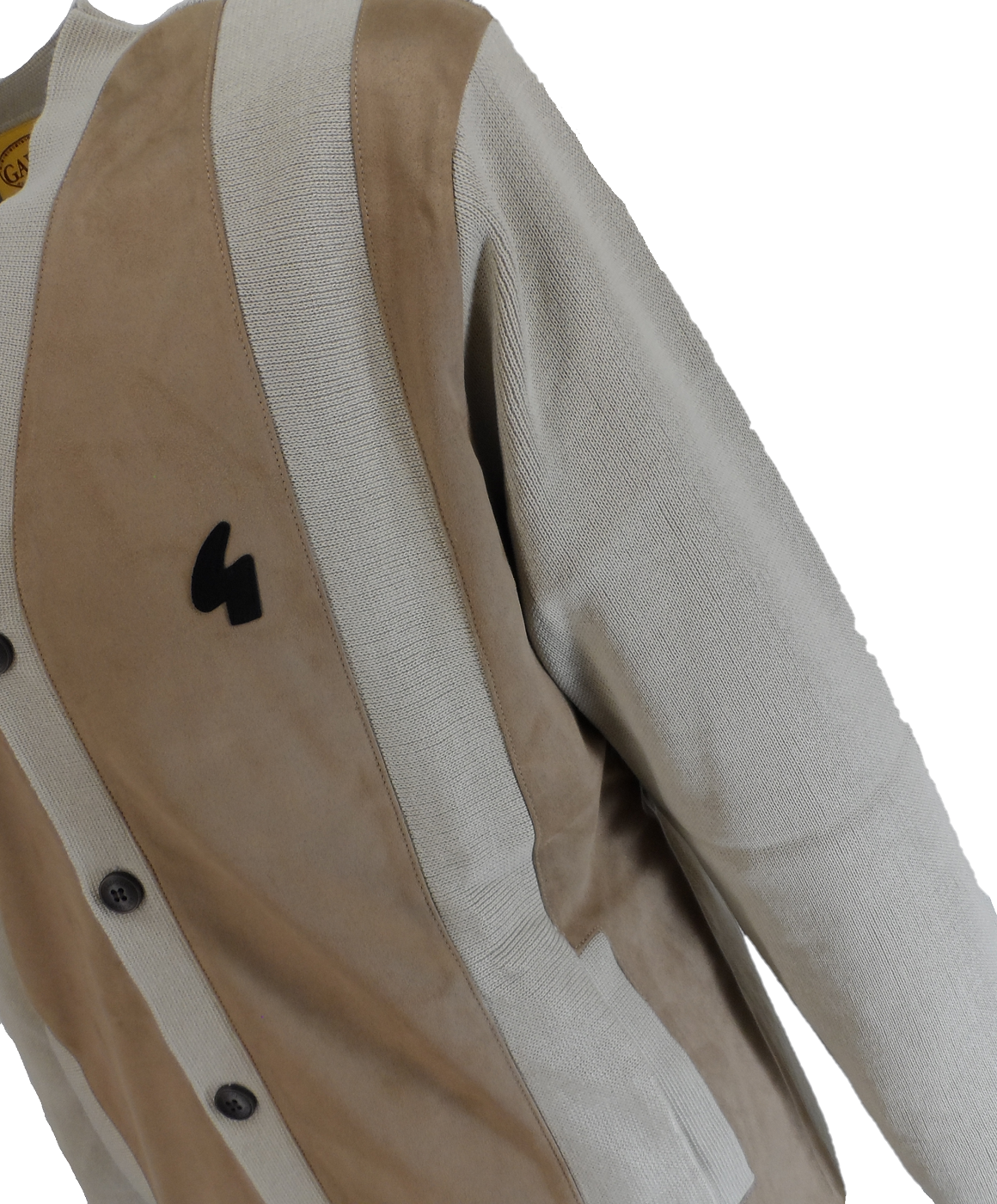 A close-up of a beige and off-white color-blocked cardigan sweater with a black embroidered logo on the chest, set against a plain white background.