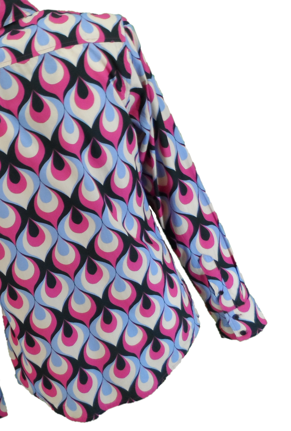 A long-sleeve button-up shirt featuring a bold 1970s-style peacock feather pattern in pink, light blue, cream, and black, shown against a plain white background.