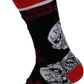 Black sock with white skull designs and red accents on a white background