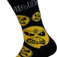 Black sock with yellow skull designs on a white background