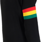 Black sweater with Rastafarian color stripes on sleeves against a white background